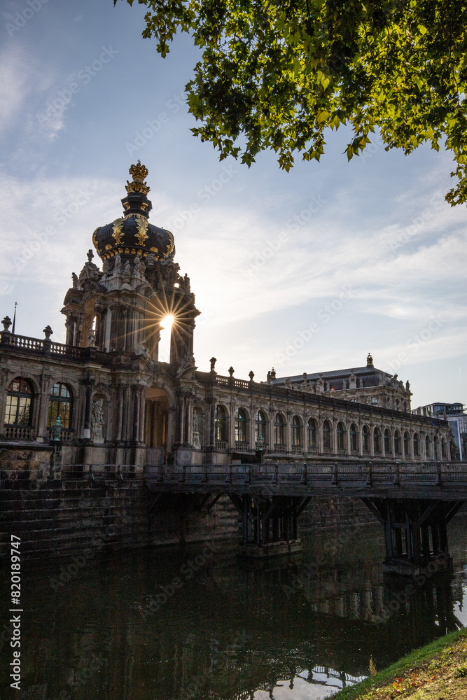 The Dresden Zwinger, a landmark of Baroque architecture. Historical buildings in the style of a castle. Orangery at sunrise in the morning in the city of Dresden, Saxony, Germany The Dresden Zwinger, a landmark of Baroque architecture. Historical buildings in the style of a castle. Orangery at sunrise in the morning in the city of Dresden, Saxony, Germany