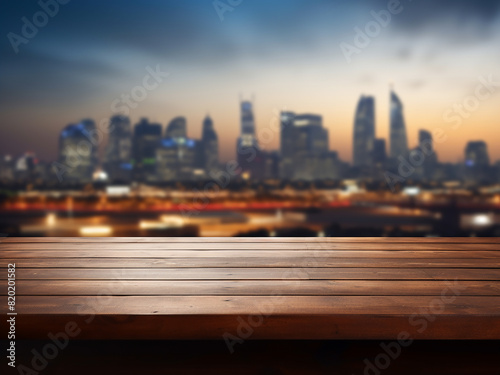 Behind an empty wooden table  a lively cityscape blurs in the background