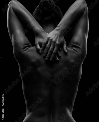 Black-white silhouette of female shoulders and hands . Female silhouette. © Dimid
