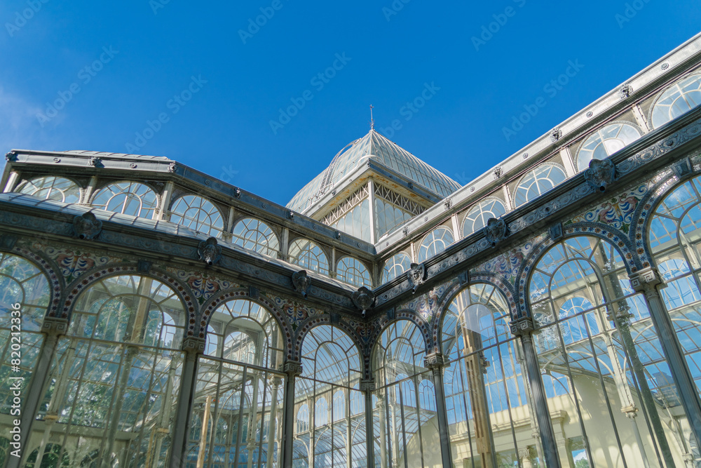 Photograph of the Crystal Palace in El Retiro park. Architecture. City of Madrid. Green area. European tour Photograph of the Crystal Palace in El Retiro park. Architecture. City of Madrid. Green area. European tour