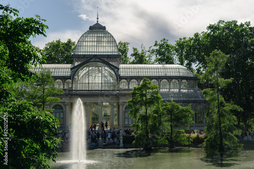 Photograph of the Crystal Palace in El Retiro park. Architecture. City of Madrid. Green area. European tour