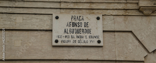 Plaque of the Plaza de Alfonso de Alburqueque placed on a wall in Lisbon