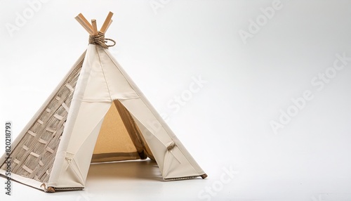 Native American people  concept paper origami isolated on white background of a tipi or teepee  conical lodge tent  home or house  with copy space  simple starter craft for kids