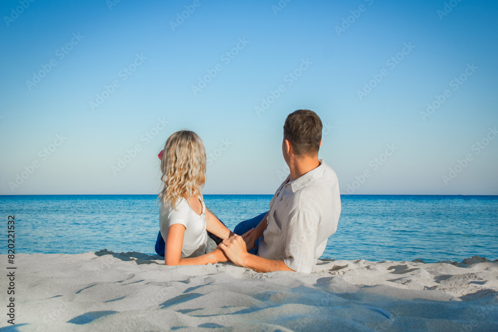happy loving couple by the sea in the nature happy loving couple by the sea in the nature