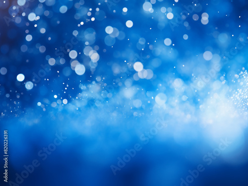 Background blurs with abstract, blue bokeh light