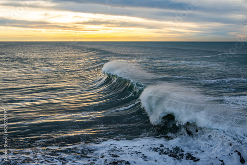 Waves in the middle of the sea at dawn