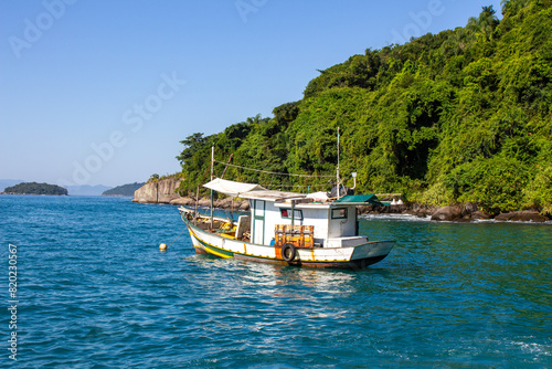 Barco turístico em Paraty, Rio de Janeiro. Brasil photo