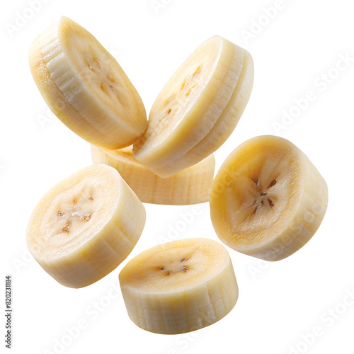 Pieces of ripe delicious banana on a white background fall vertically down