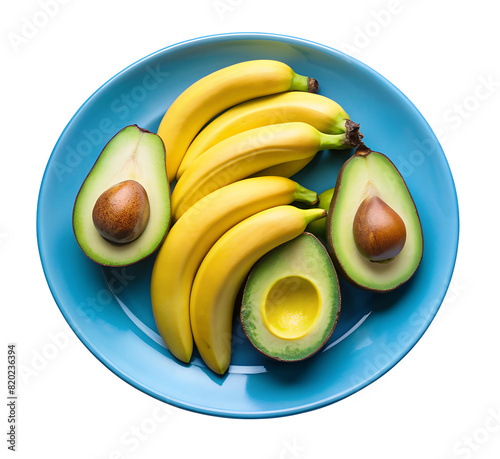 Yellow bananas and green avocados on a blue plate, delicious vegetarian breakfast, eco, raw food, vegan dish

