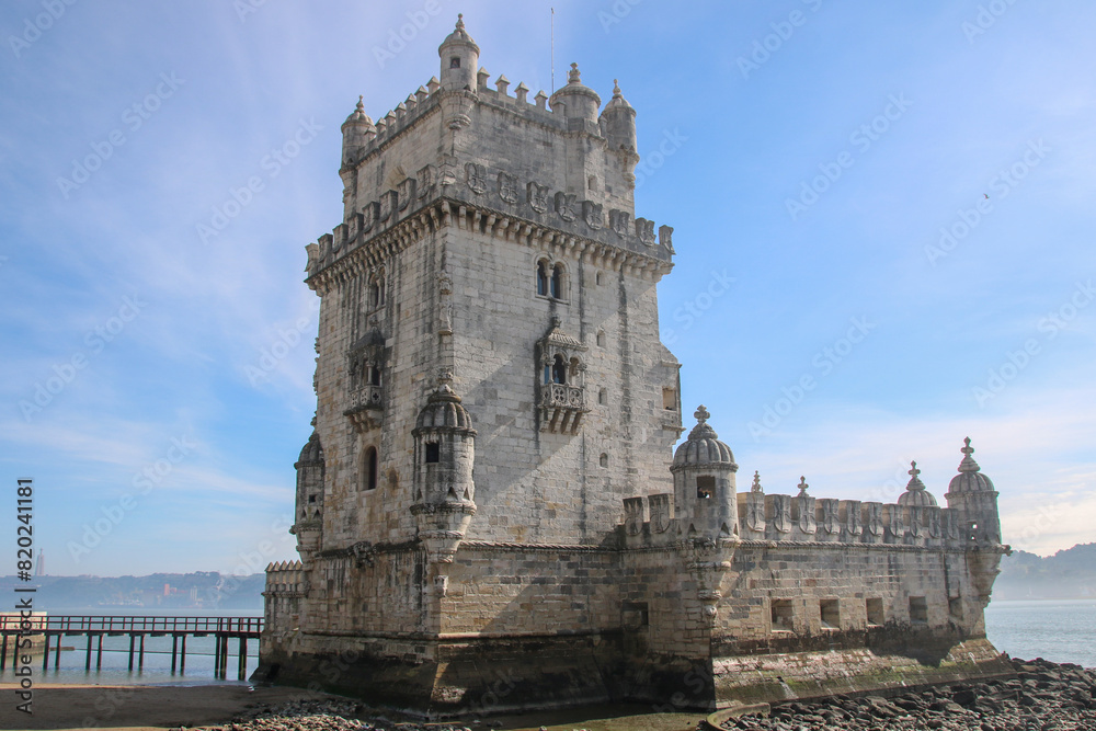 The Belém Tower is an old military construction, located at the mouth of the Tagus River, in the Santa Maria de Belém neighborhood, together with the Jerónimos Monastery in Lisbon, Portugal. The Belém Tower is an old military construction, located at the mouth of the Tagus River, in the Santa Maria de Belém neighborhood, together with the Jerónimos Monastery in Lisbon, Portugal.