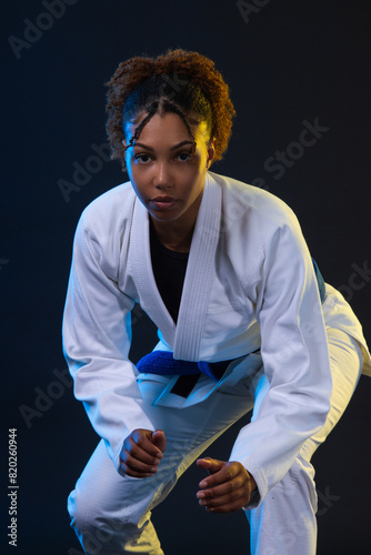 Brazilian girl Jujutsu fighter is ready for the Jiu Jitsu wrestling competition. Brazilian sport ju-jitsu. Mixed martial arts.