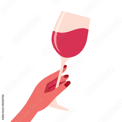 hand holding a glass of red wine, symbolizing relaxation and sophistication