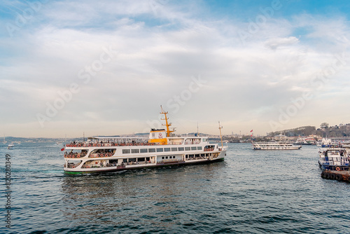 Traffic in the waters of the Bosphorus. Regular traffic of various watercraft from the port in Istanbul. © Tishina