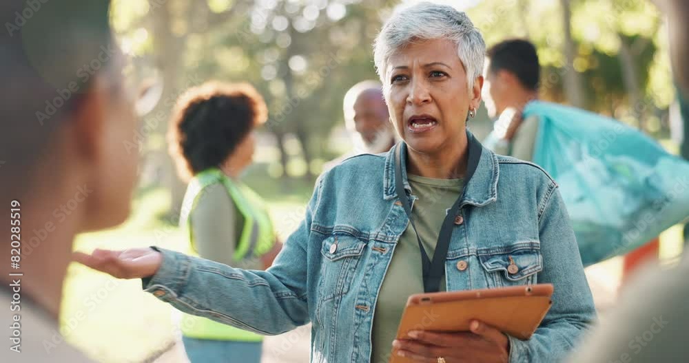 Park, mature woman or volunteers talking for support, community project or plastic for nature sustainability. Humanitarian, recycling or leader speaking of checklist, charity service or NGO together