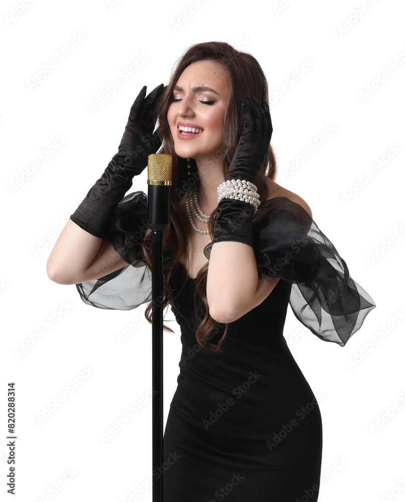 Beautiful young woman in stylish black dress with microphone singing on white background Beautiful young woman in stylish black dress with microphone singing on white background