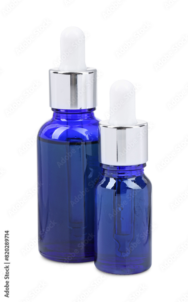 Blue bottles with tincture isolated on white Blue bottles with tincture isolated on white