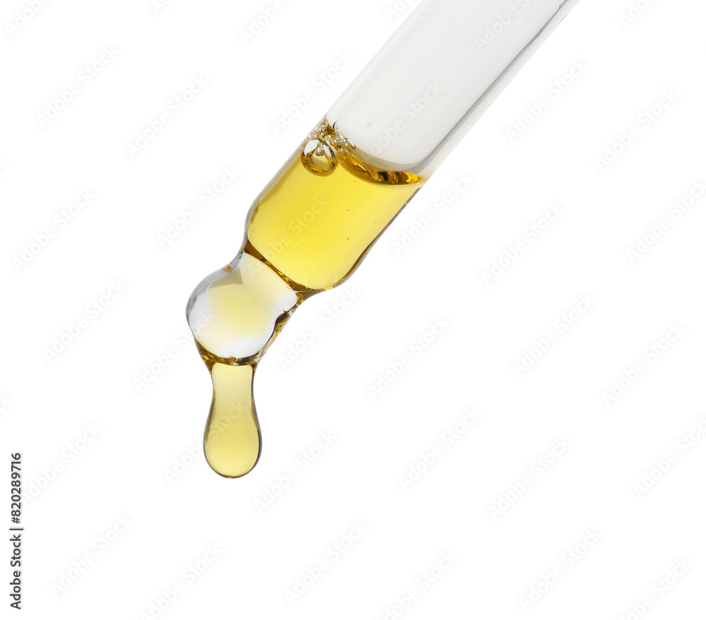Fototapeta premium Dripping tincture from pipette isolated on white