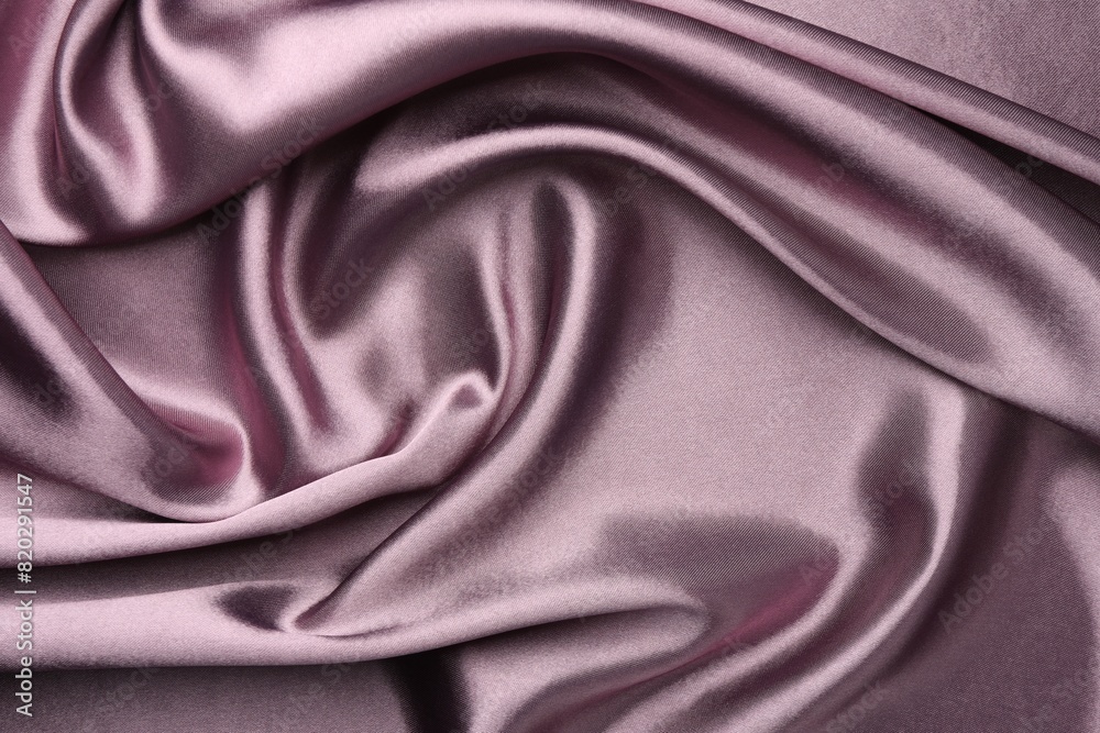 Obraz premium Crumpled dark purple silk fabric as background, top view