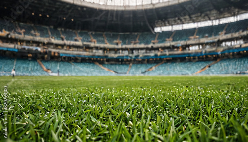 Close up grass ield view of soccer field stadium and stadium seats photo