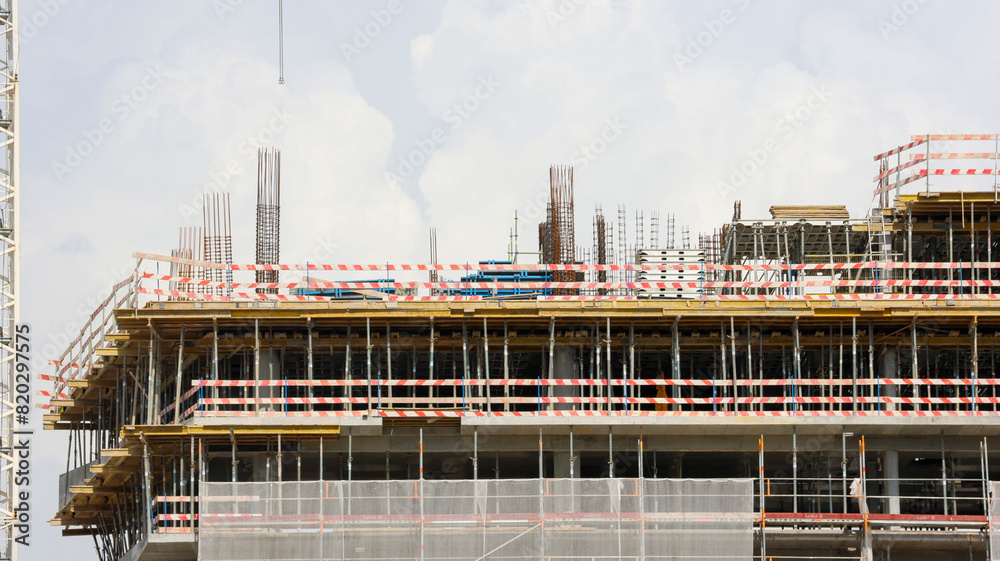 Construction site progress with scaffolding Construction site progress with scaffolding