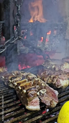 vertical video of person seasoning roast grilled meat and wine 4