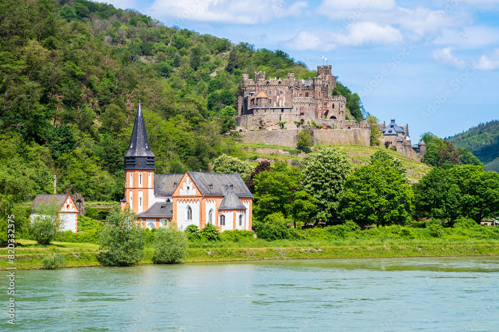 Naklejka premium Reichenstein castle in Trechtingshausen on Rhine River bank in Rhineland-Palatinate, Germany. Rhine valley is famous tourist destination for romantic river cruise and short vacation