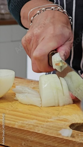 vertical video of step-by-step preparation of traditional Argentine food for national holidays at a family reunion with a huge pot for many portions 4