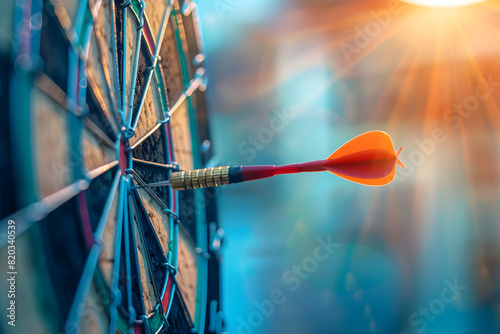 Bullseye success - dart in center of dartboard photo