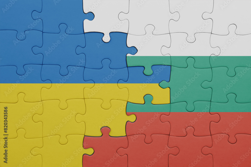 puzzle with the colourful national flag of bulgaria and flag of ukraine. puzzle with the colourful national flag of bulgaria and flag of ukraine.
