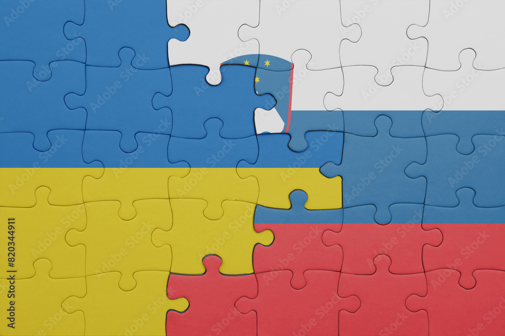 puzzle with the colourful national flag of slovenia and flag of ukraine. puzzle with the colourful national flag of slovenia and flag of ukraine.