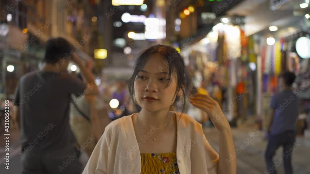 Drunk alcoholic woman Asian Vietnamese woman travel at night, drinking beer in market. People walking street fair in Hanoi city, Vietnam. Retail shops Drunk alcoholic woman Asian Vietnamese woman travel at night, drinking beer in market. People walking street fair in Hanoi city, Vietnam. Retail shops