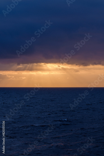Panoramic view of the cloudy Aegean Sea and a golden  sunrise © DIMITRIOS