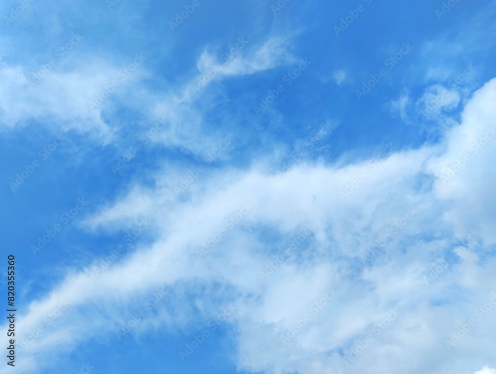 Fototapeta premium White clouds and blue sky. The view of the clouds and sky is clear and calming 