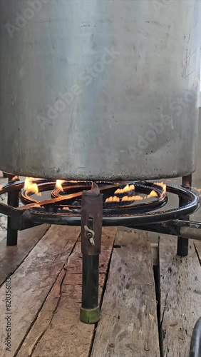 vertical video of step-by-step preparation of traditional Argentine food for national holidays at a family reunion with a huge pot for many portions 16