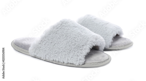 Pair of soft slippers with fur isolated on white