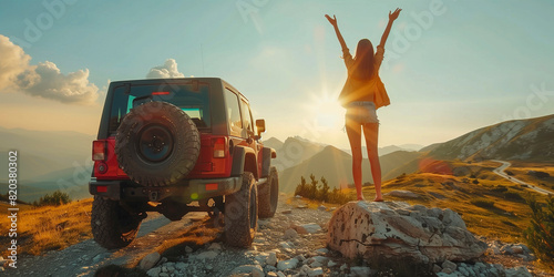Woman embracing the dawn travelling with her Jeep