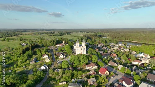 Aerial early summer evening view of Moletai town in Lithuania. Aerial video flight over Moletai, the lake district of Lithuania. photo