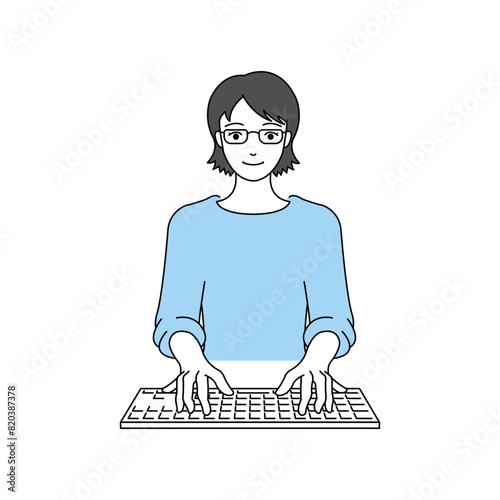 キーボードを打つ女性