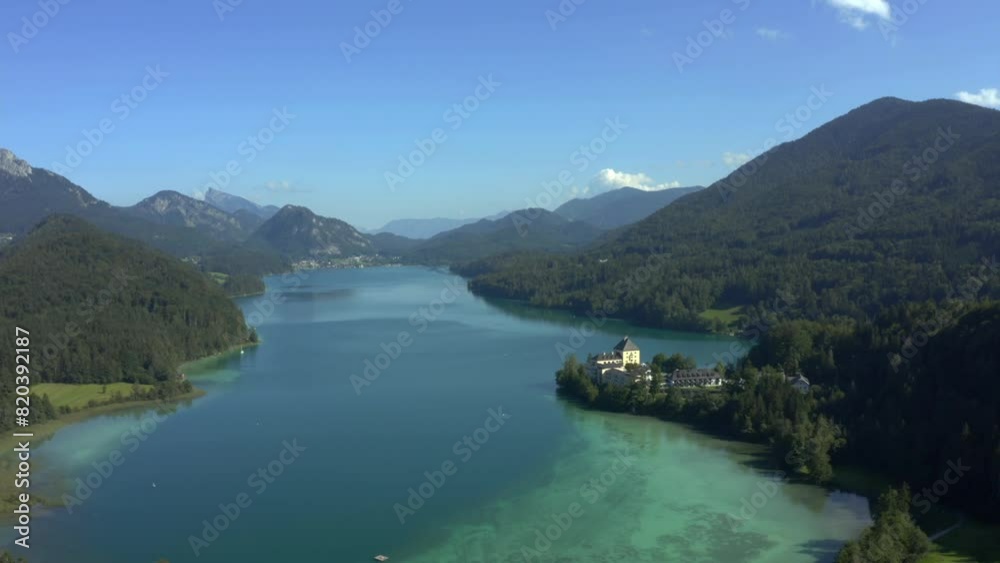 Drone flight over Lake Fuschl with Fuschl Castle, Fuschl am See, Salzkammergut, Salzburg province, Austria, Europe Drone flight over Lake Fuschl with Fuschl Castle, Fuschl am See, Salzkammergut, Salzburg province, Austria, Europe