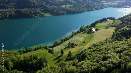 Drone flight over Lake Fuschl and Fuschl am See, Salzkammergut, Salzburg province, Austria, Europe photo