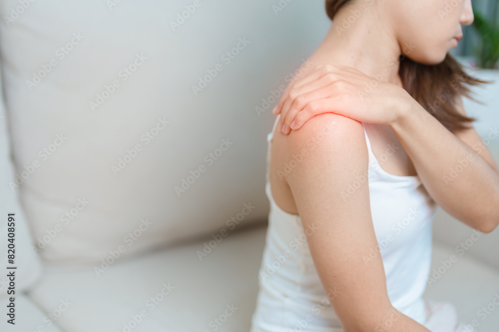 Woman having Shoulder and Neck pain at home. Muscle painful due to Myofascial pain syndrome and Fibromyalgia, rheumatism, Scapular pain, Cervical Spine. ergonomic concept Woman having Shoulder and Neck pain at home. Muscle painful due to Myofascial pain syndrome and Fibromyalgia, rheumatism, Scapular pain, Cervical Spine. ergonomic concept