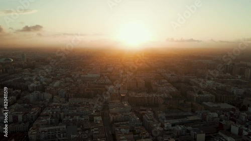 Enchanting Sunset Over Bustling Coastal Cityscape, Captured at Dusk