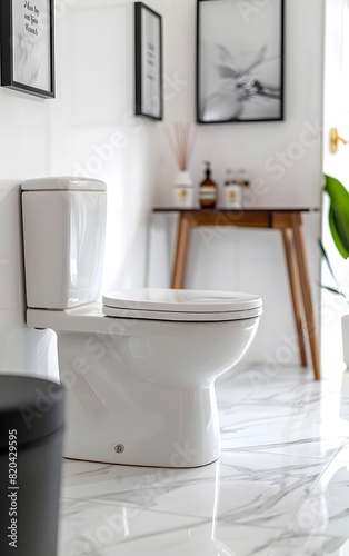 A modern minimalist toilet with white ceramic and wood grain accents  a stylish bathroom table in the background  a closeup shot in bright light