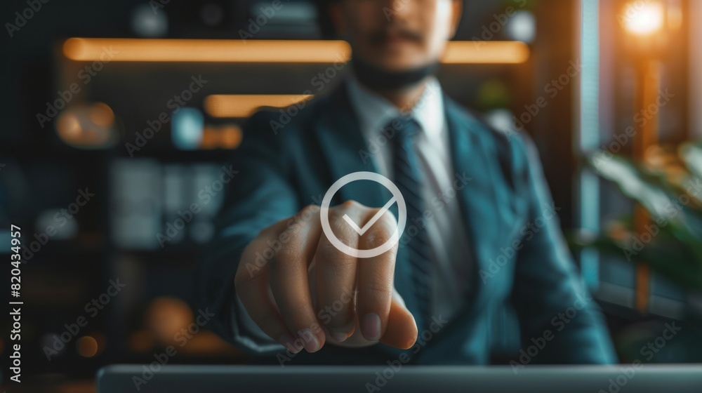 Businessman taps the correct mark on the checkbox for the quality document checklist. Businessman taps the correct mark on the checkbox for the quality document checklist.