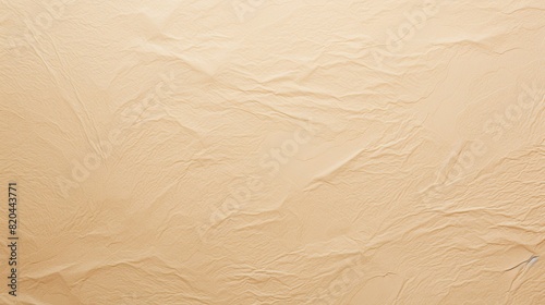 Abstract sandy beige crumpled paper texture, perfect for backgrounds and artistic designs