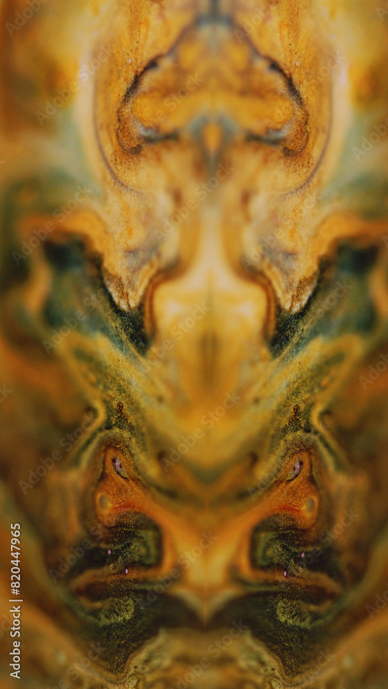 Glitter fractal. Blur background. Defocused golden yellow black white color shiny marble paint mix flow symmetrical ornament abstract art texture.