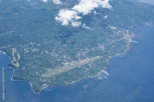 Tokyo,Japan - May 15, 2024:  Aerial view of Oshima airport or Tokyo Oshima Camellia Airport in Izu Oshima island, Tokyo photo