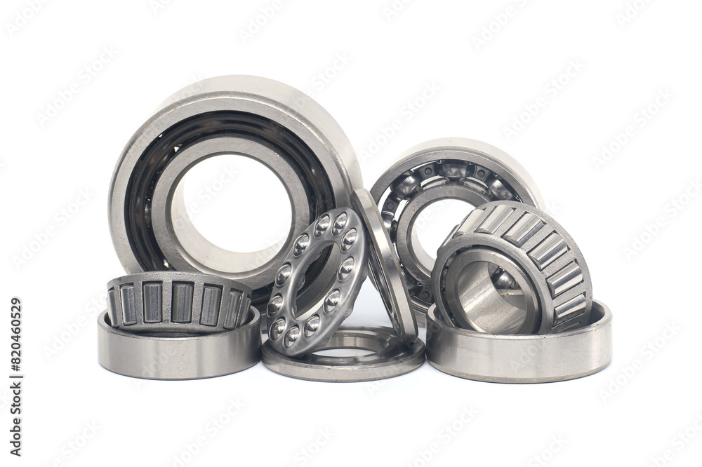 Roller bearings and ball bearings isolated on white Roller bearings and ball bearings isolated on white