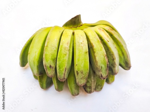 Pisang Kepok, or Kepok Banana, or Musa acuminata × balbisiana, is a popular type of banana in Indonesia. These bananas are usually processed into banana chips or steamed before consumption. photo