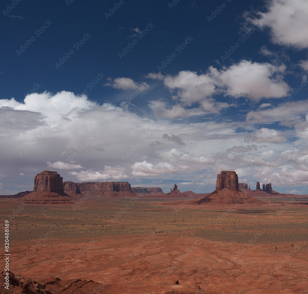Monument Valley view from Artist's Point location, East Mitten and Merrick Butte, nice dramatic clouds above Monument Valley view from Artist's Point location, East Mitten and Merrick Butte, nice dramatic clouds above